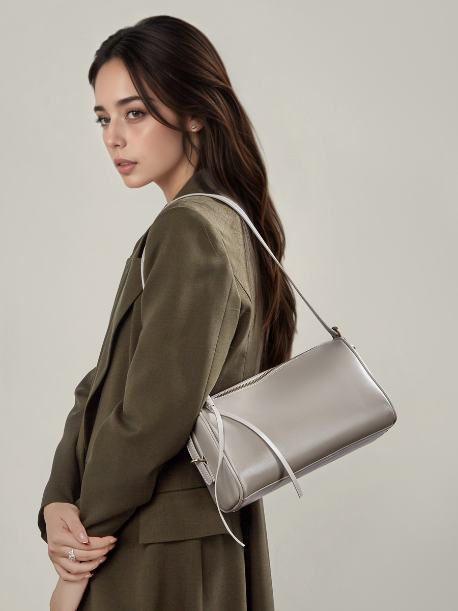 YY-CRO-023 veg-tan pillow crossbody bag in light blue — wholesale designer pillow crossbody YANYAN