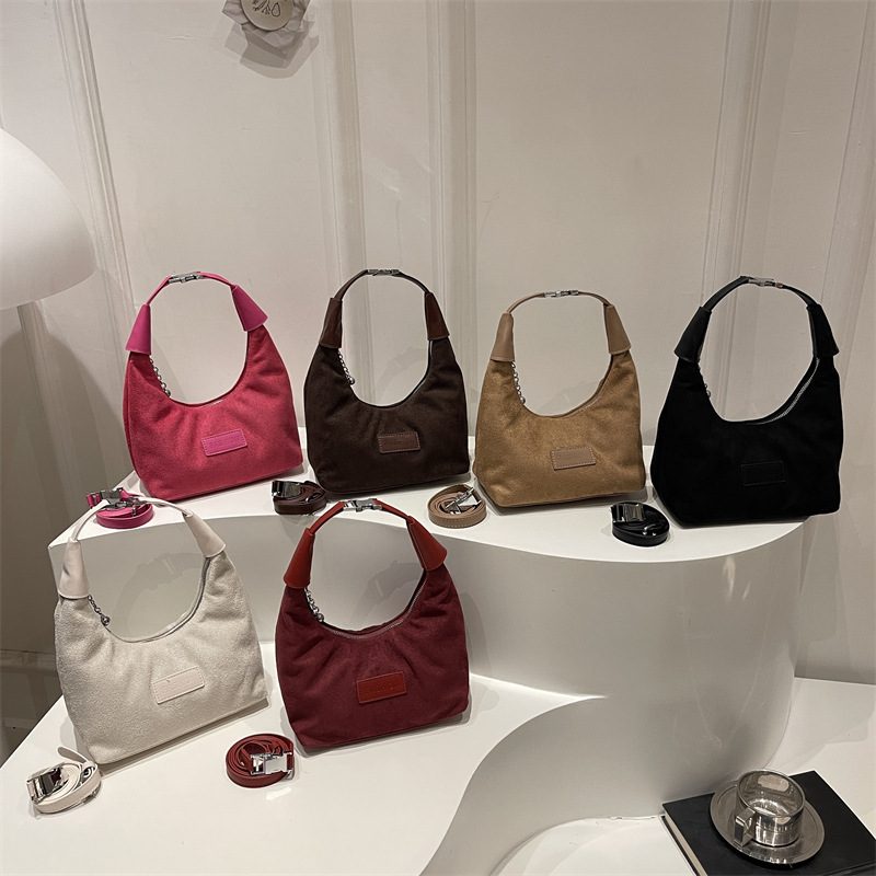 Matte Dumpling Horn Crossbody Bag