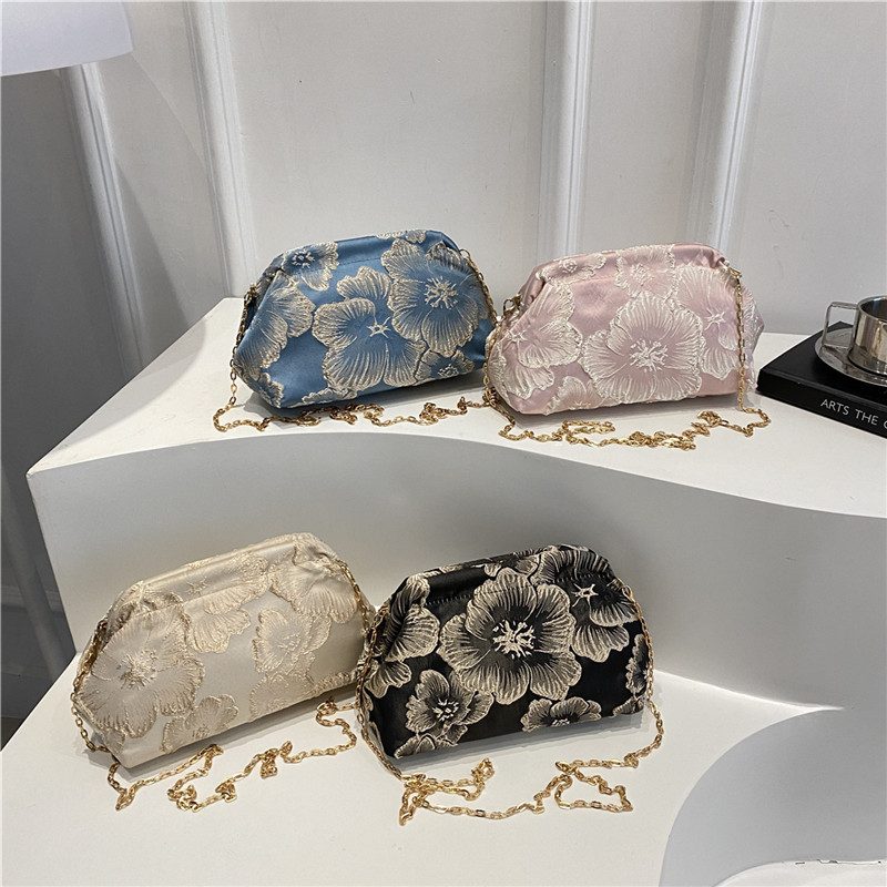 Chain Lock Quilted Crossbody Bag