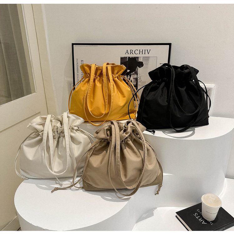 Drawstring Stitched Shoulder Bag